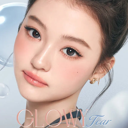 Close up of OLENS Glowy Tear Charcoal monthly lens showing cool charcoal color blend