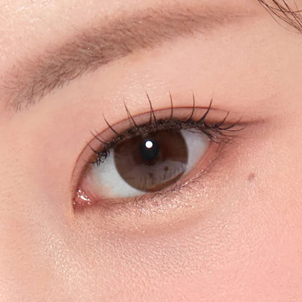 Model wearing OLENS Misty Natural Choco daily colored contacts for sweet innocent natural eyes